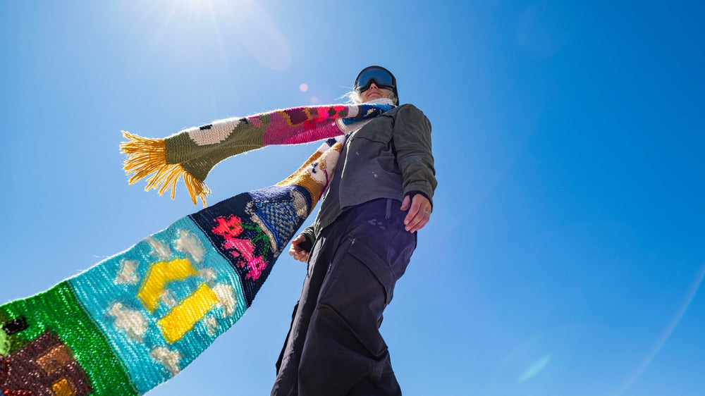 Armada Snowboard athlete, Stefi Luxton, with the scarf behind the do-si-so