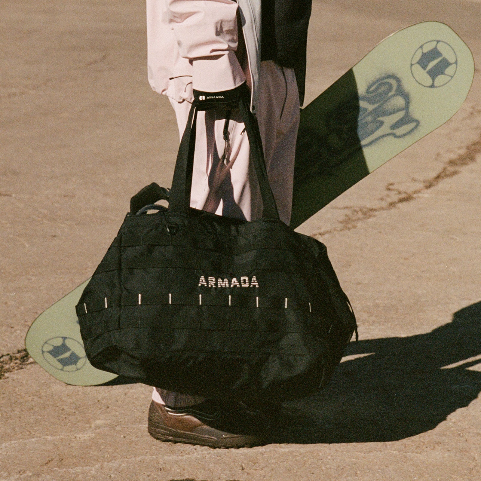Skier carrying skis